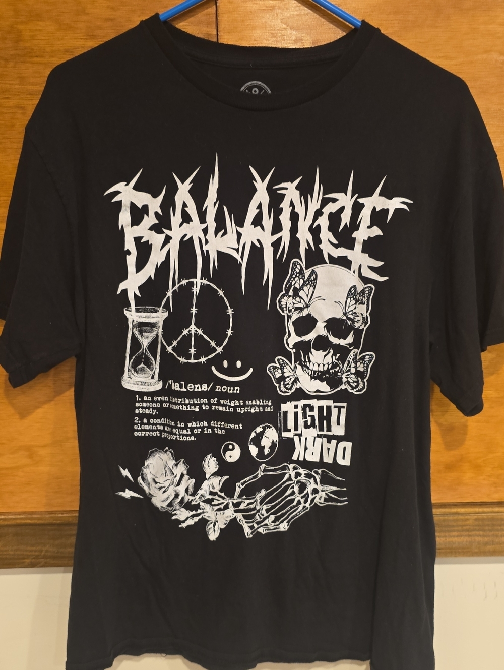 Black Graphic Unisex Tee with White Skull & Text Design